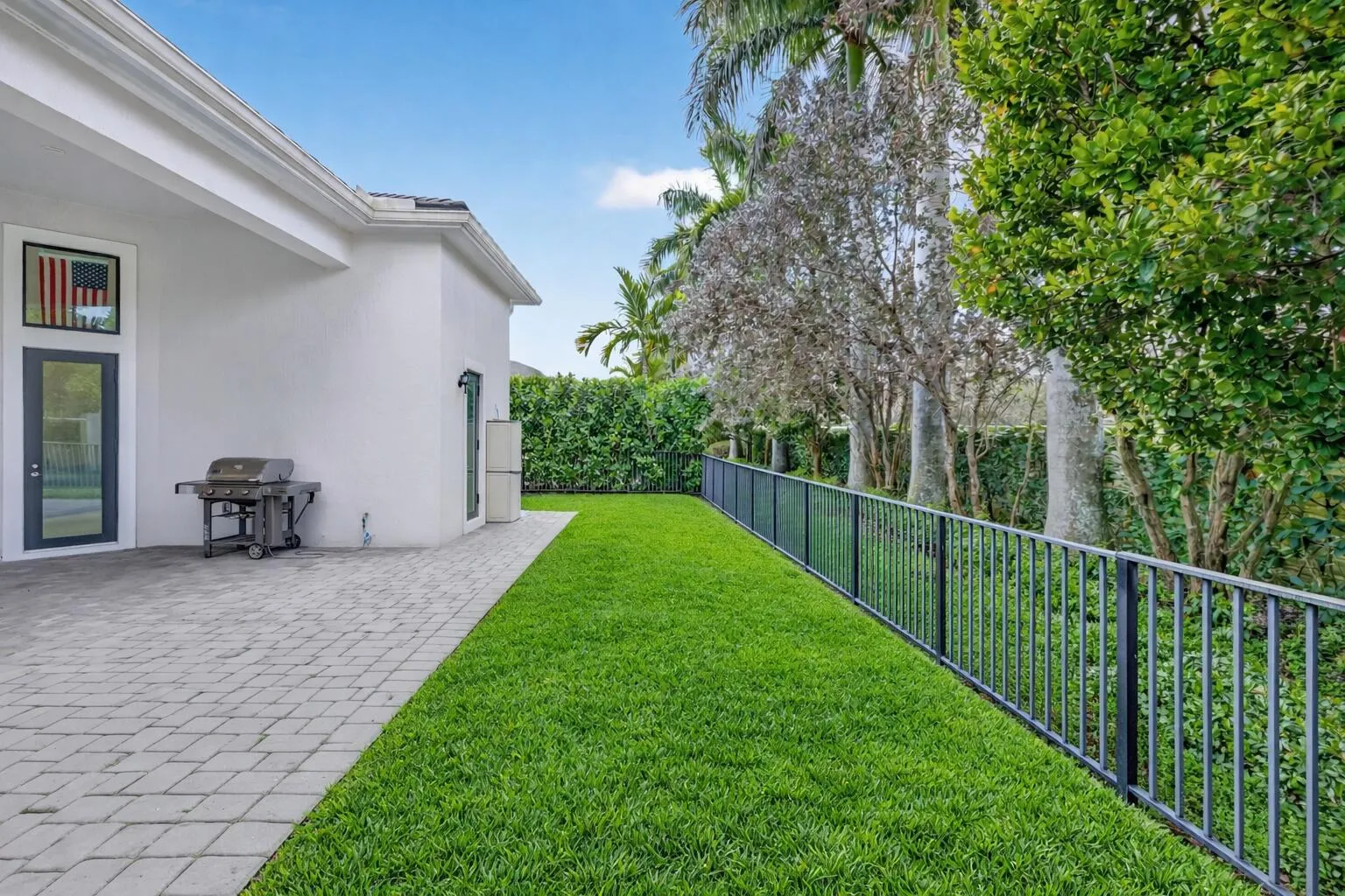 Backyard retreat with lush lawn