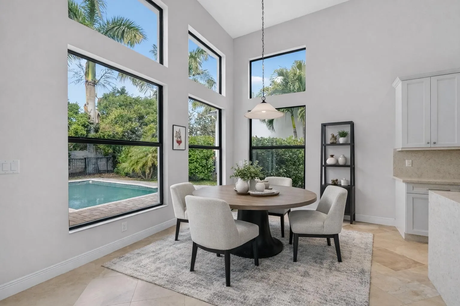 Bright breakfast nook with tropical view