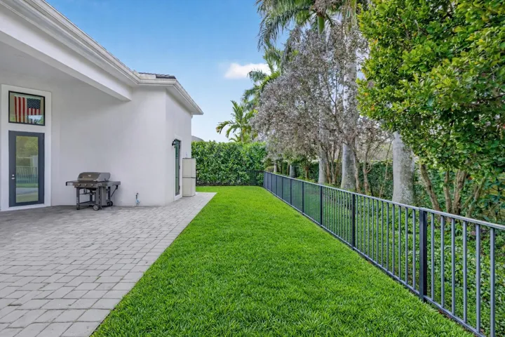 Backyard retreat with lush lawn