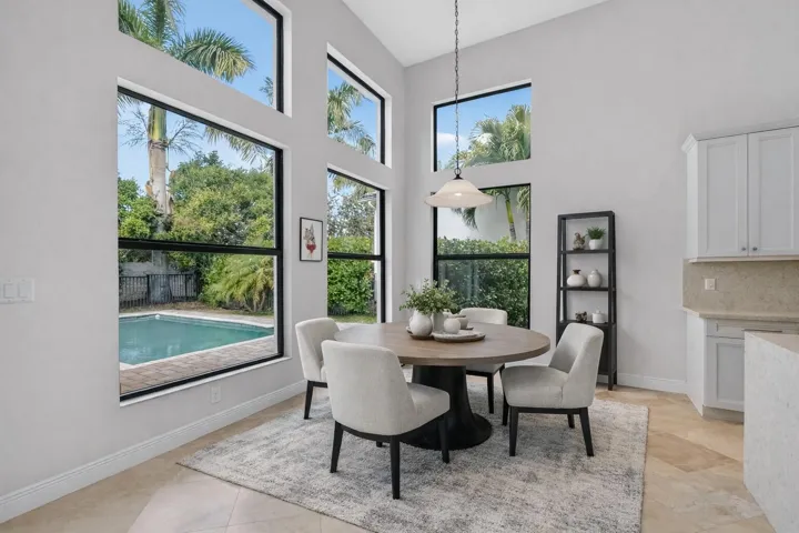 Bright breakfast nook with tropical view