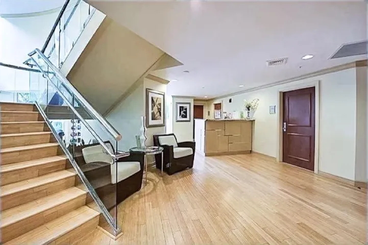 2 level fitness center with HIS & HERS lockerrooms with saunas, showers and private massage room