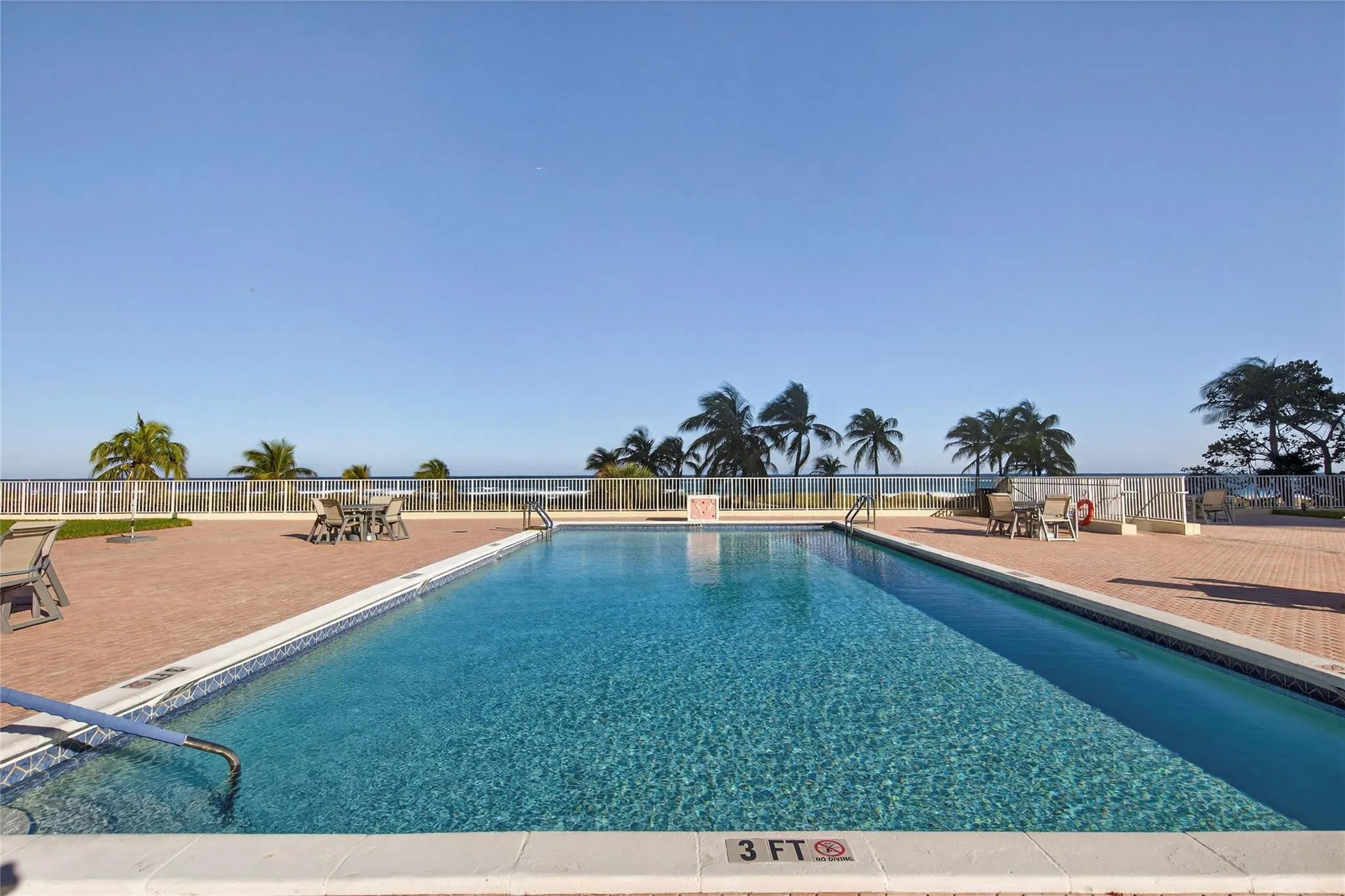 Large pool overlooking the ocean