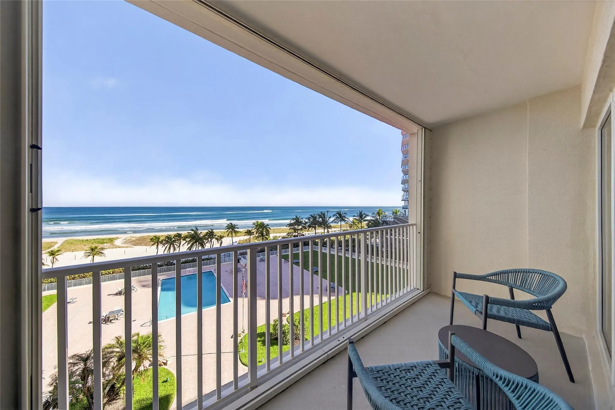 Incredible view from your balcony. Direct view of pool and ocean.