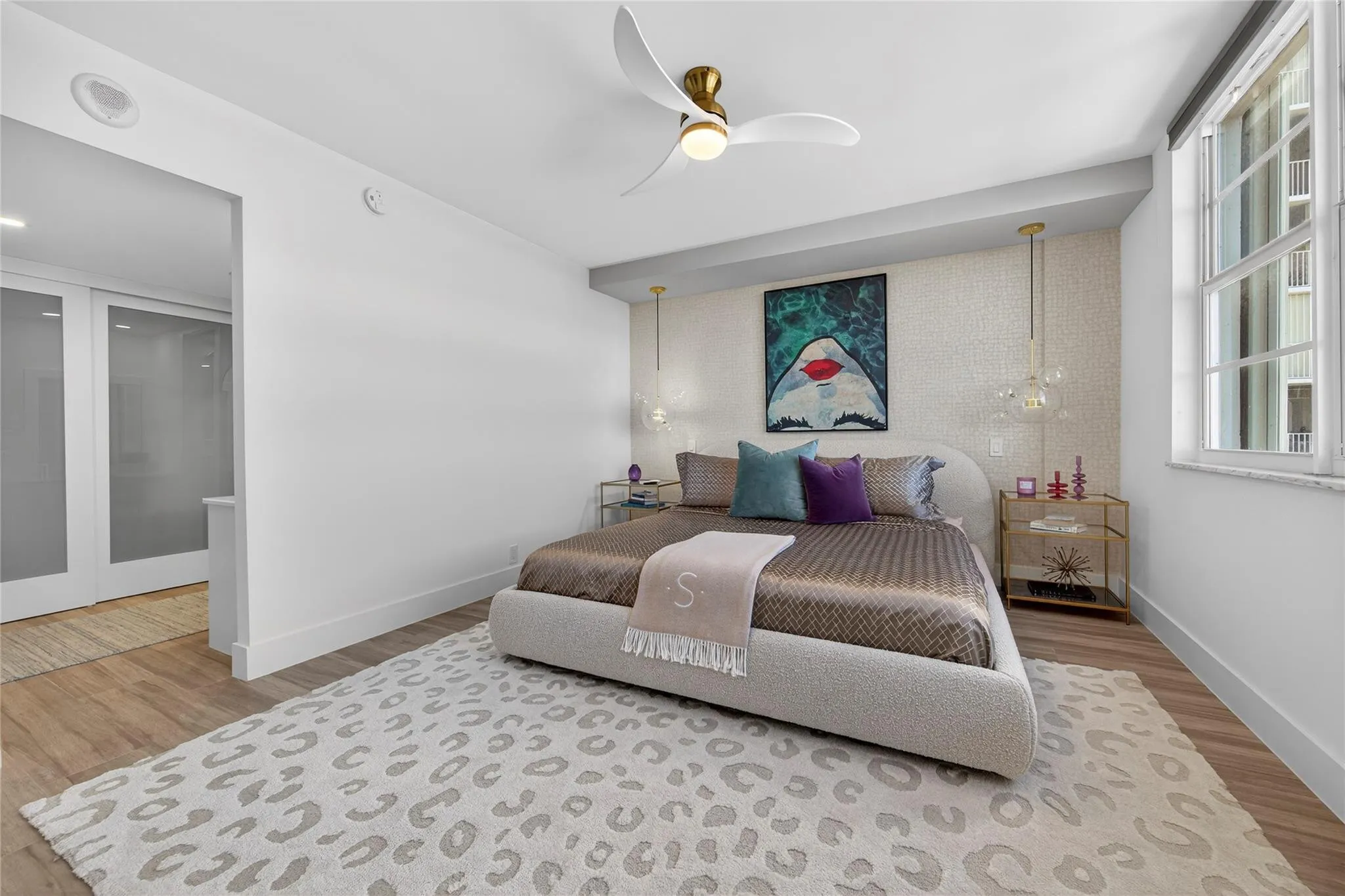 Primary bedroom with large closets, dressing area and European style ensuite bath