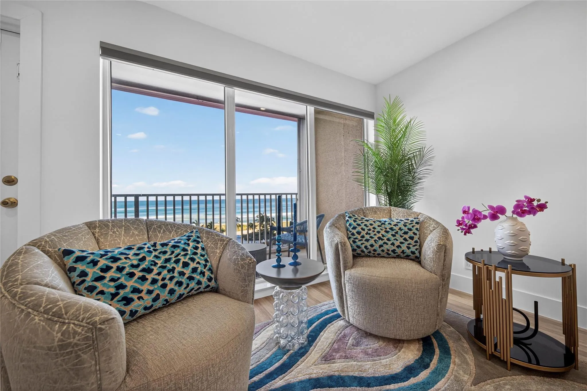 with a view of the balcony and ocean