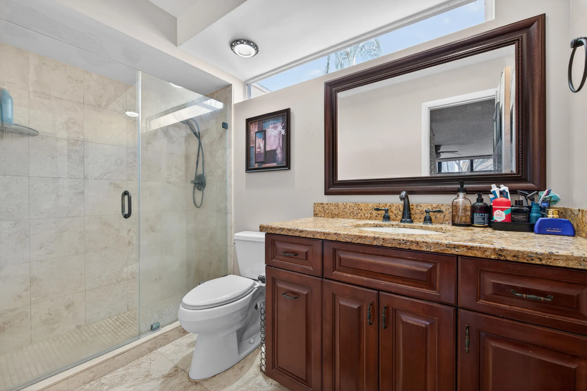 Main bathroom with stand in shower
