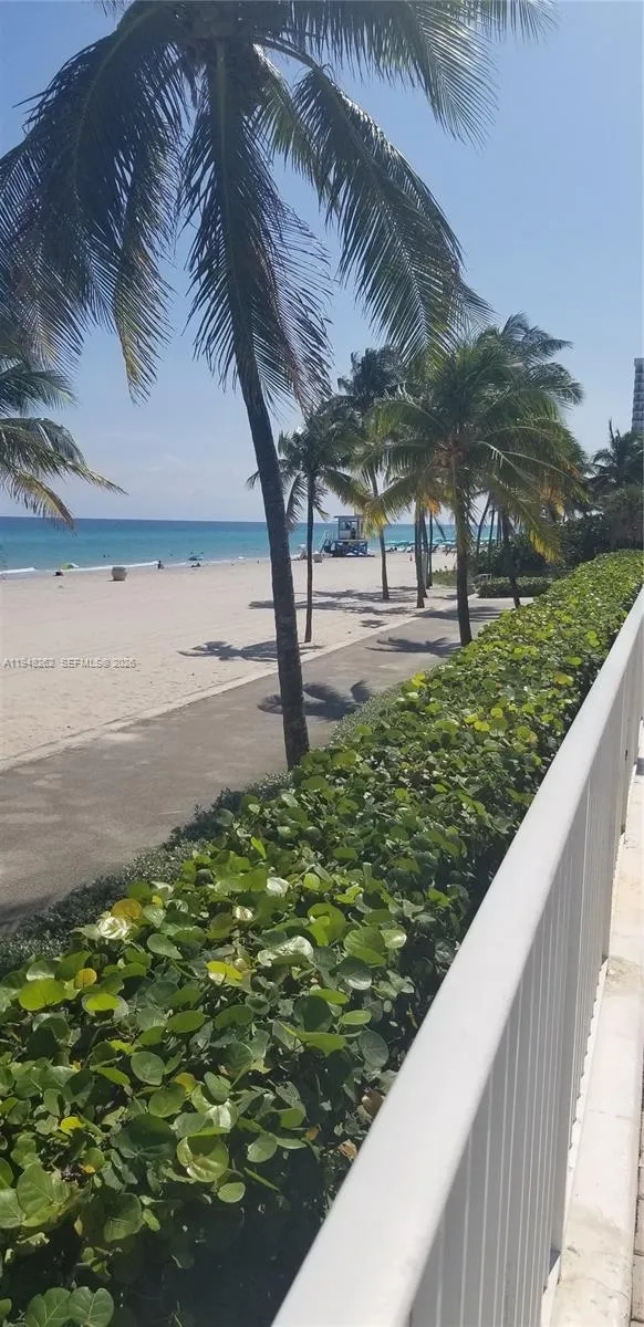 mini board walk right between the beach and the lower pool to walk, stroll and or sit