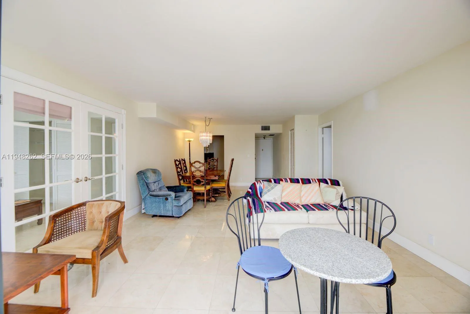 dining and living areas with foyer and NO POPCORN cielings