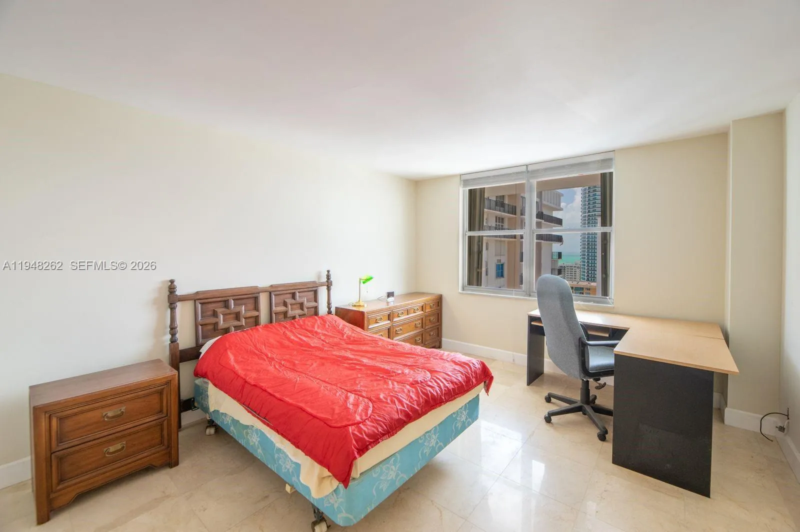 spacious master bedroom with ocean and bay views