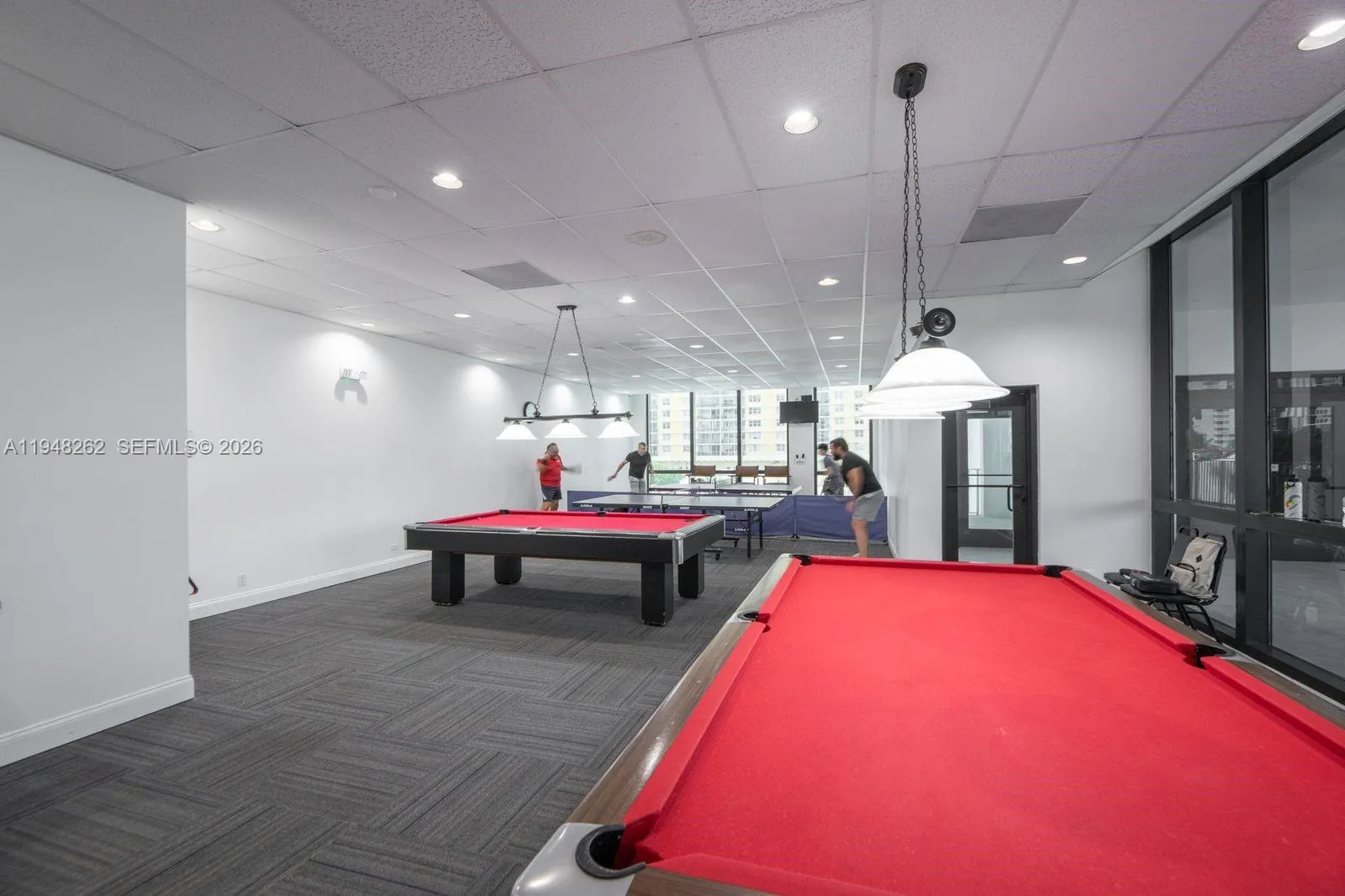 2 billiards tables and 2 ping pong tables