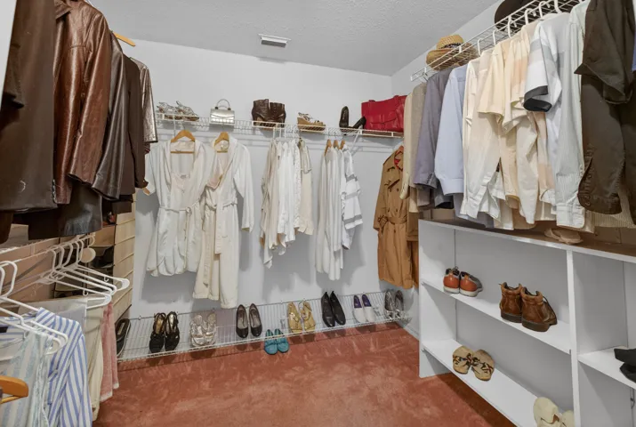 MAIN SUITE WALK IN CLOSET