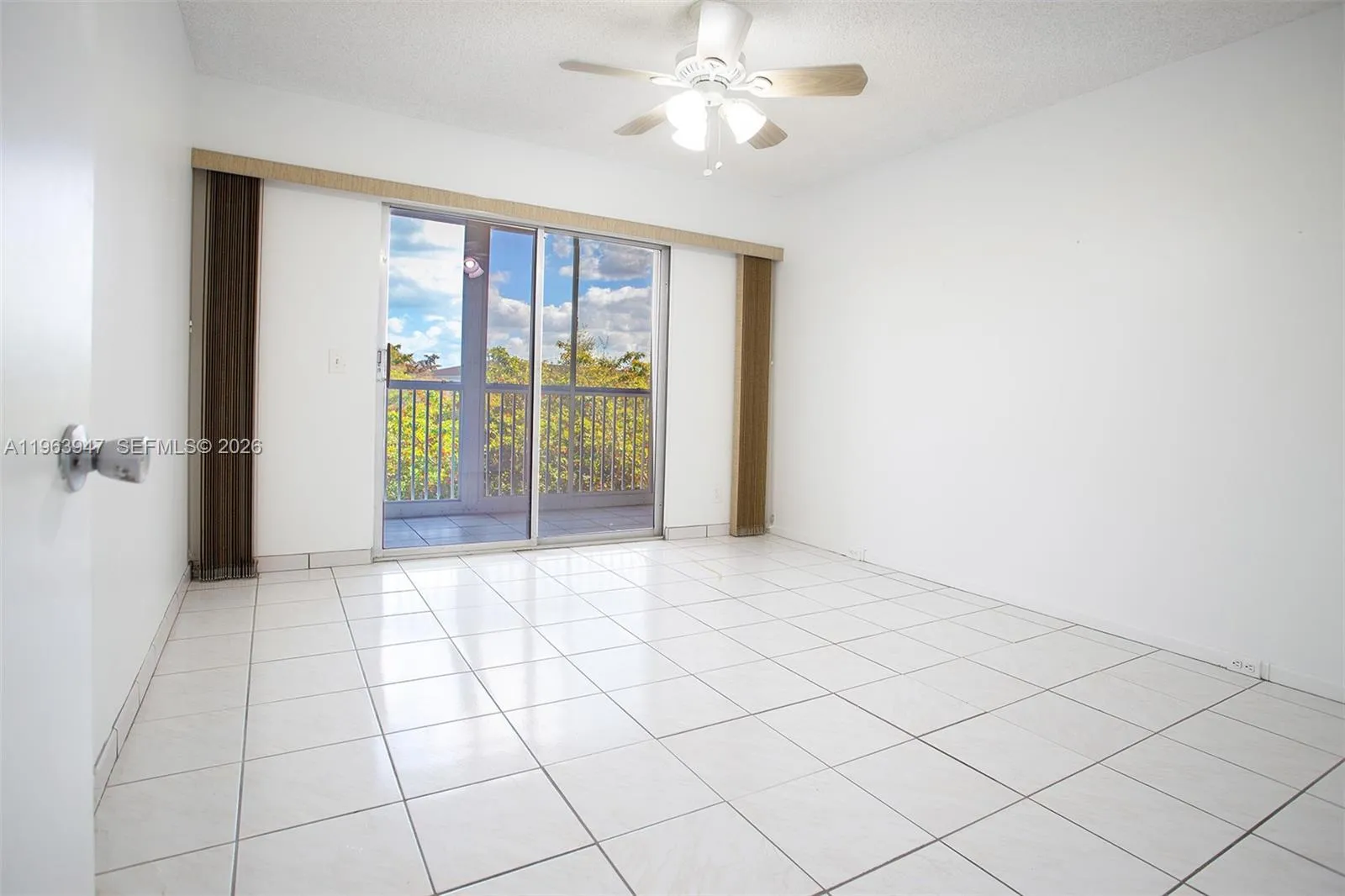 GUEST BEDROOM LEADING TO BALCONY