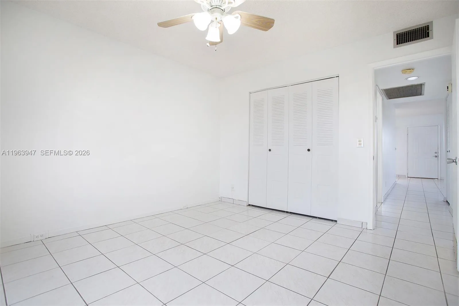 SPACIOUS GUEST TILED BEDROOM