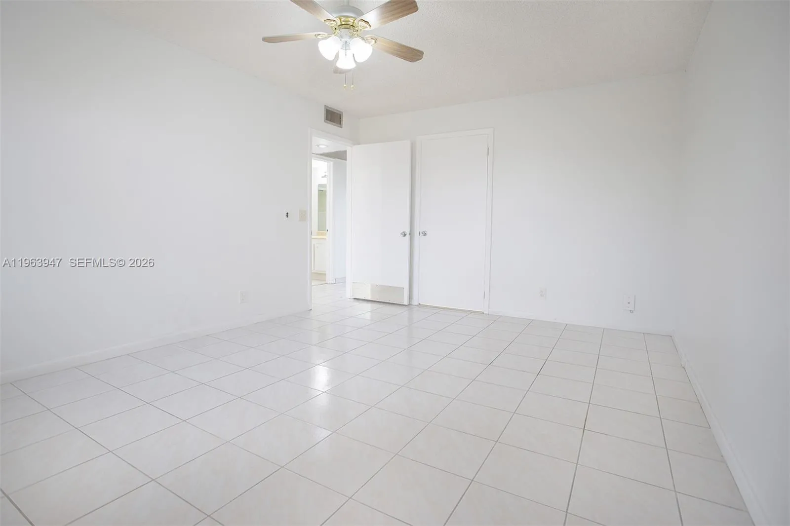 LARGE PRIMARY TILED BEDROOM