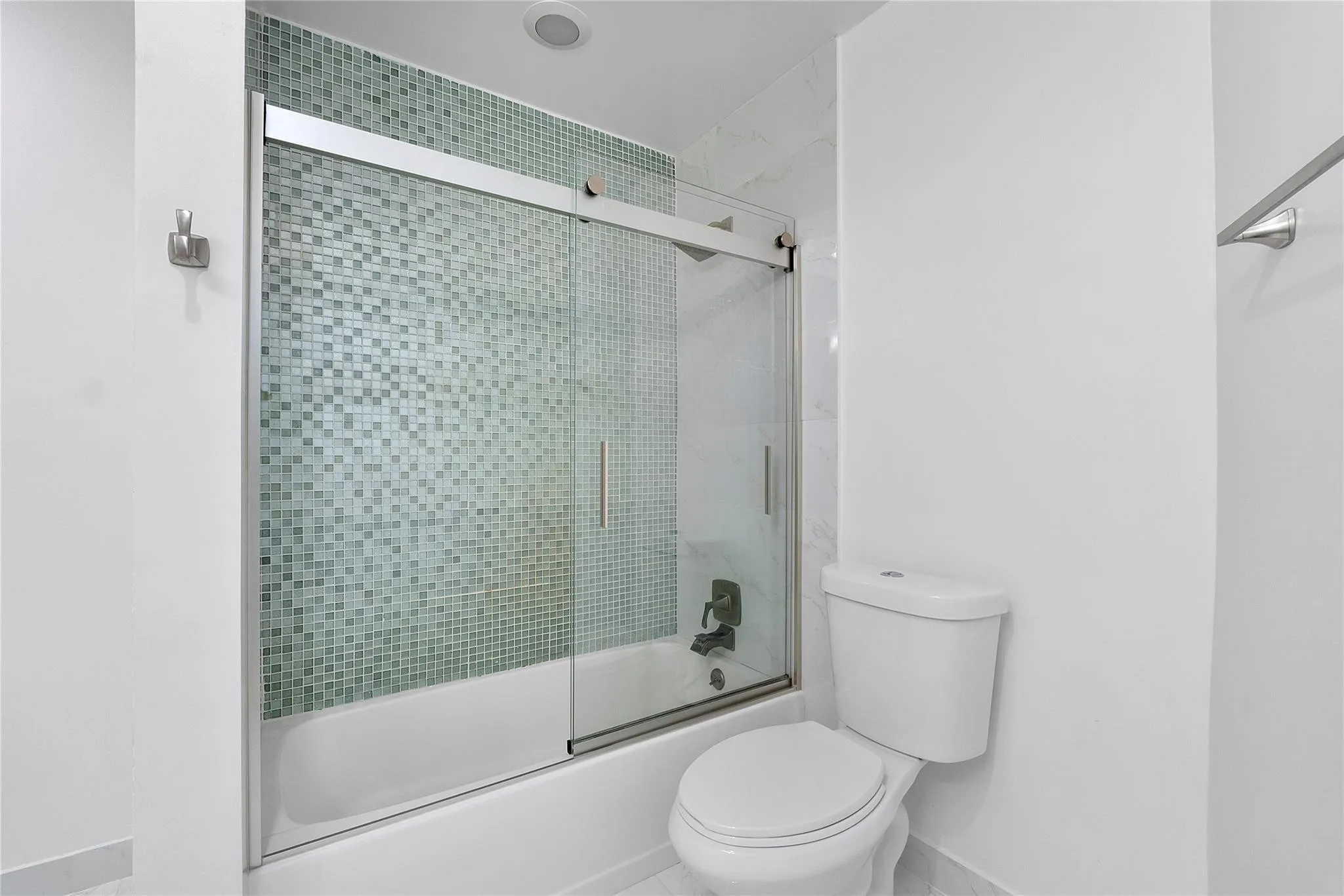 Another pretty updated white bathroom