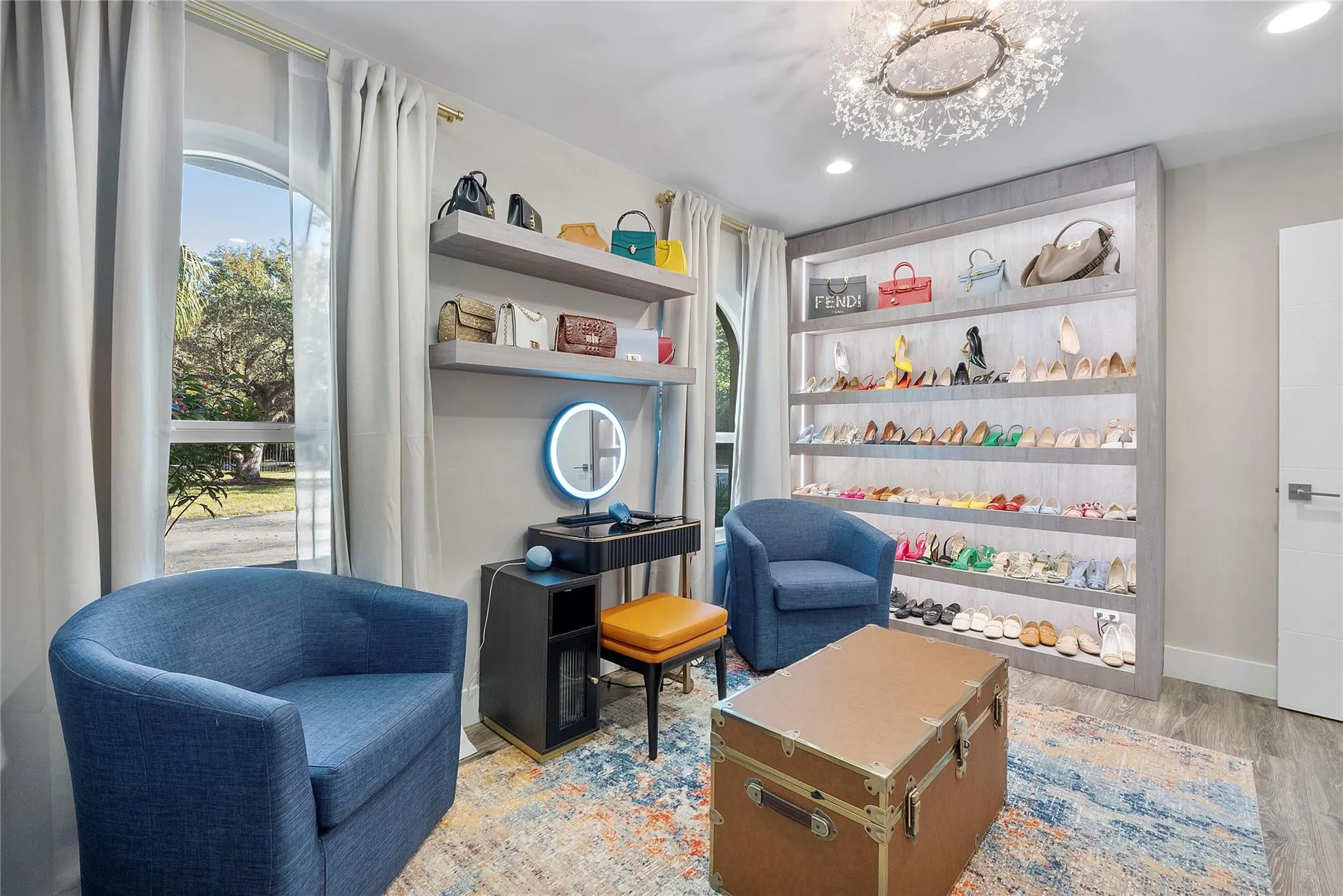 This bedroom has it all, 2 sunny windows & designer closets, shelves & lighting, A King or Queen bed can easily be placed here,