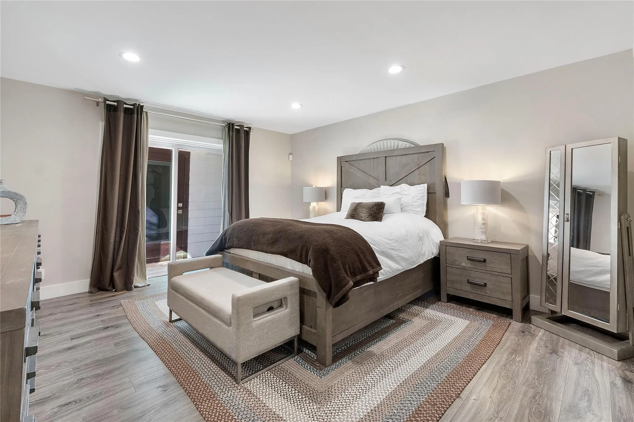 The Primary bedroom with ample space for a King bed, 2 nightstands and then some