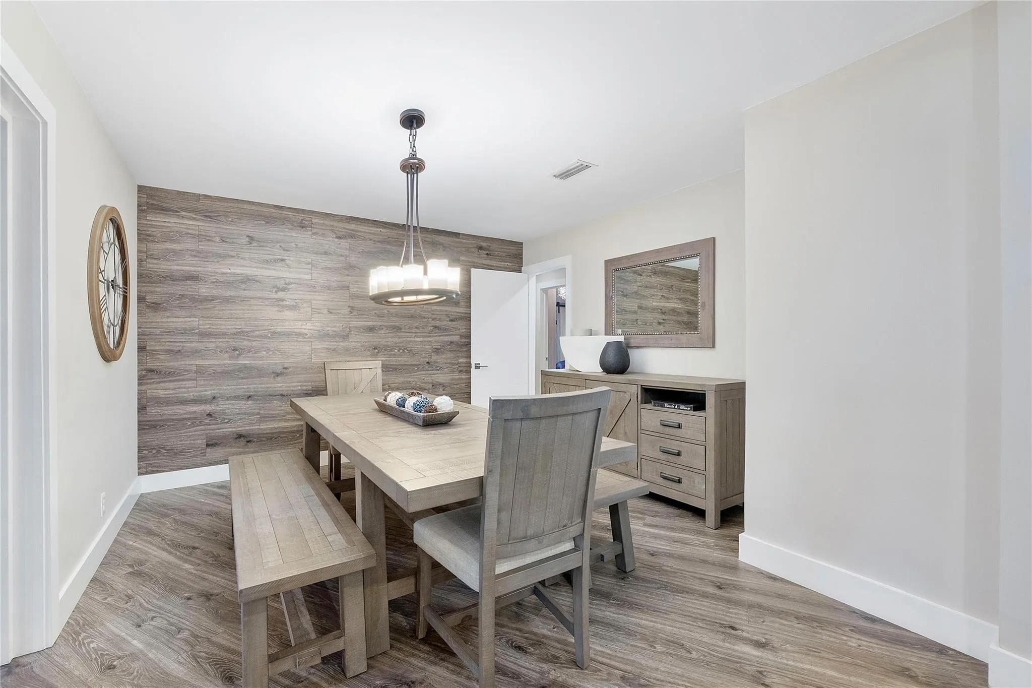 The beautiful Formal dining room with the matching accent wall adorns timeless elegance, Furniture negotiable