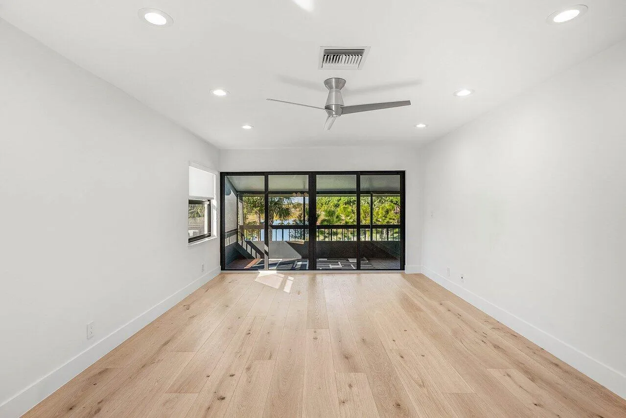 Living room with impact sliding doors to patio.