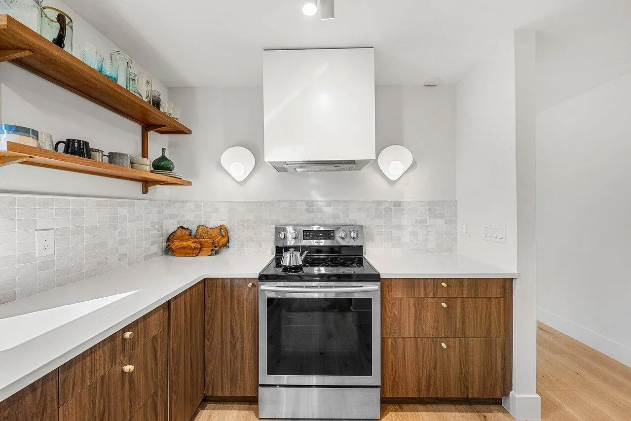 Floating decorative shelves in kitchen.