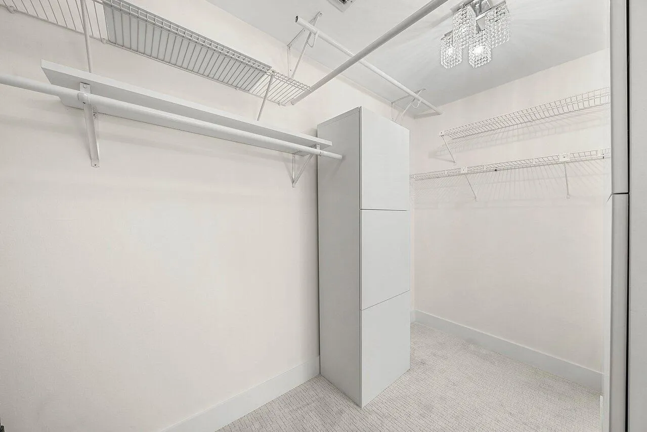 Primary walk in closet.