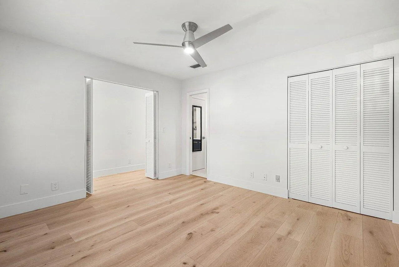 Guest bedroom, with pocket door to bathroom.