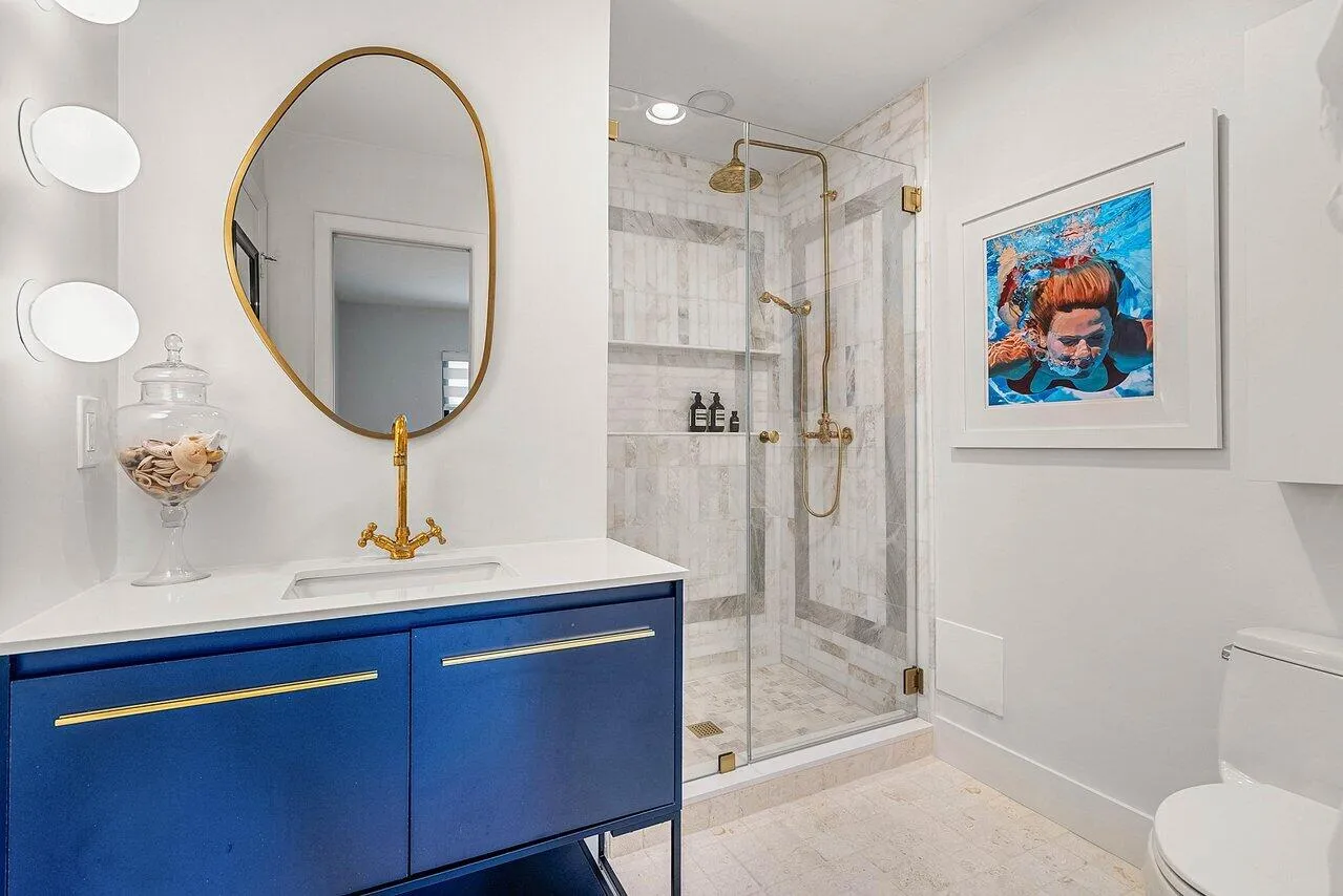 Updated guest bathroom with walkin shower.