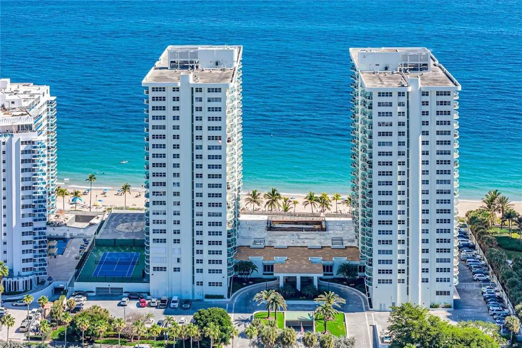 Southpoint has 2 levels of assigned under the building garage parking. There is plenty of guest parking. The lobby connects the two towers. The pool deck is between the two towers. The tennis court is to the left of the north tower.