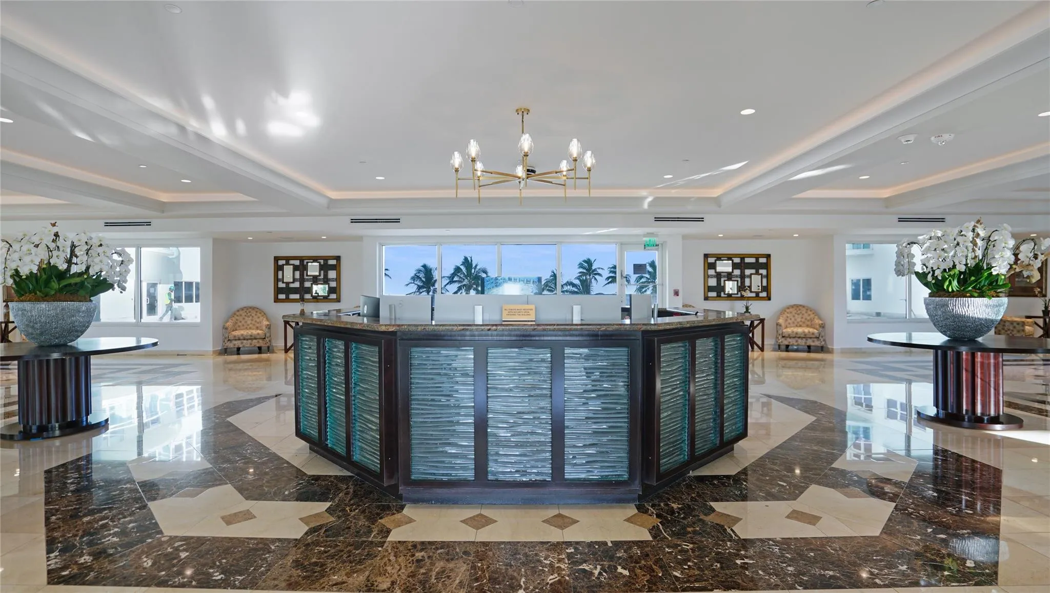 Southpoint has 24/7 security and facial recognition. The lobby looks out onto the pool deck.