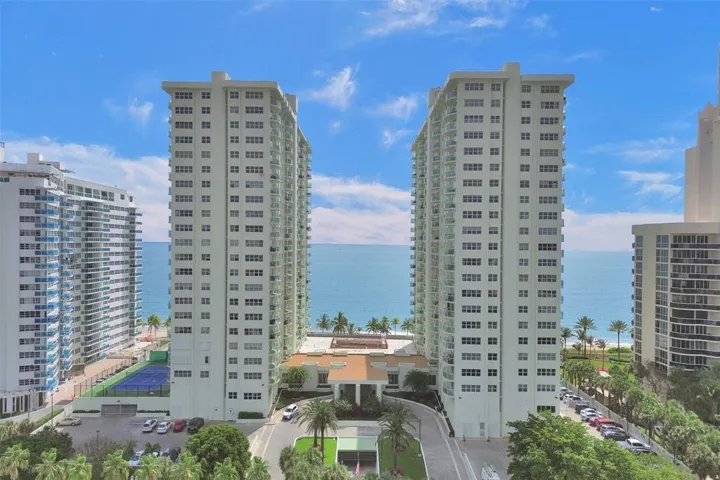 Southpoint: Two 22 story luxury high rise towers (South tower, #3400 on the right), North tower, #3410 on the left), is connected by the beautiful lobby. All apartments have washer and dryers in the units, under building/garage assigned parking, and a healthy fully funded reserve fund. Our tennis court is to the left of the north tower and our pool and pool deck is between the two towers. We have a lower beach deck, which is only a few steps to the sand, with lots of seating and amenities.