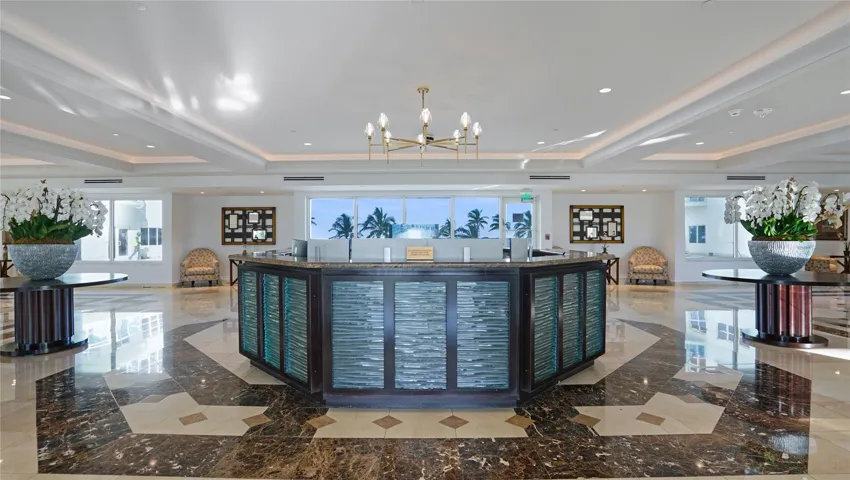 Southpoint has 24/7 security and facial recognition. The lobby looks out onto the pool deck.