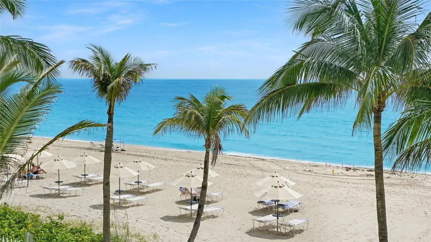 Owners enjoy use of beach chairs and umbrellas.