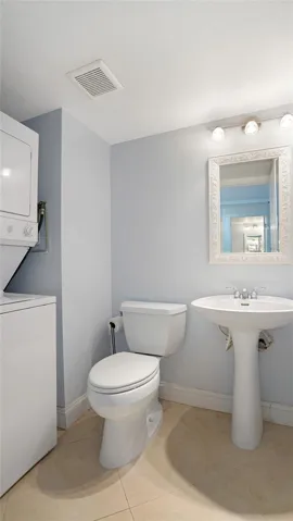 The washer and dryer is in the half bathroom.
