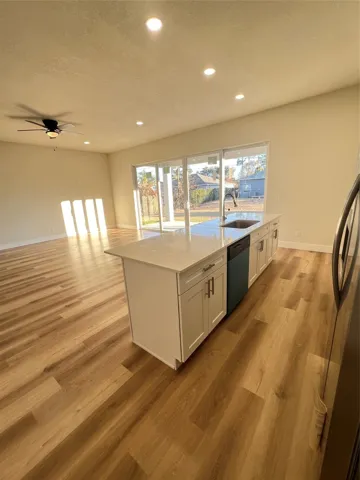 Open floor kitchen, living room area.
