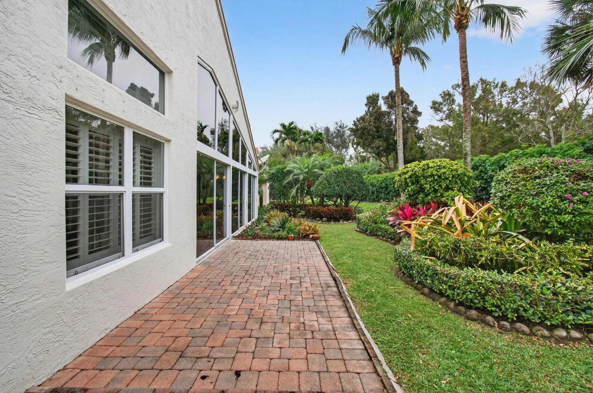 Large patio accessible from kitchen/dining area is perfect for outdoor kitchen, dining or fire pit