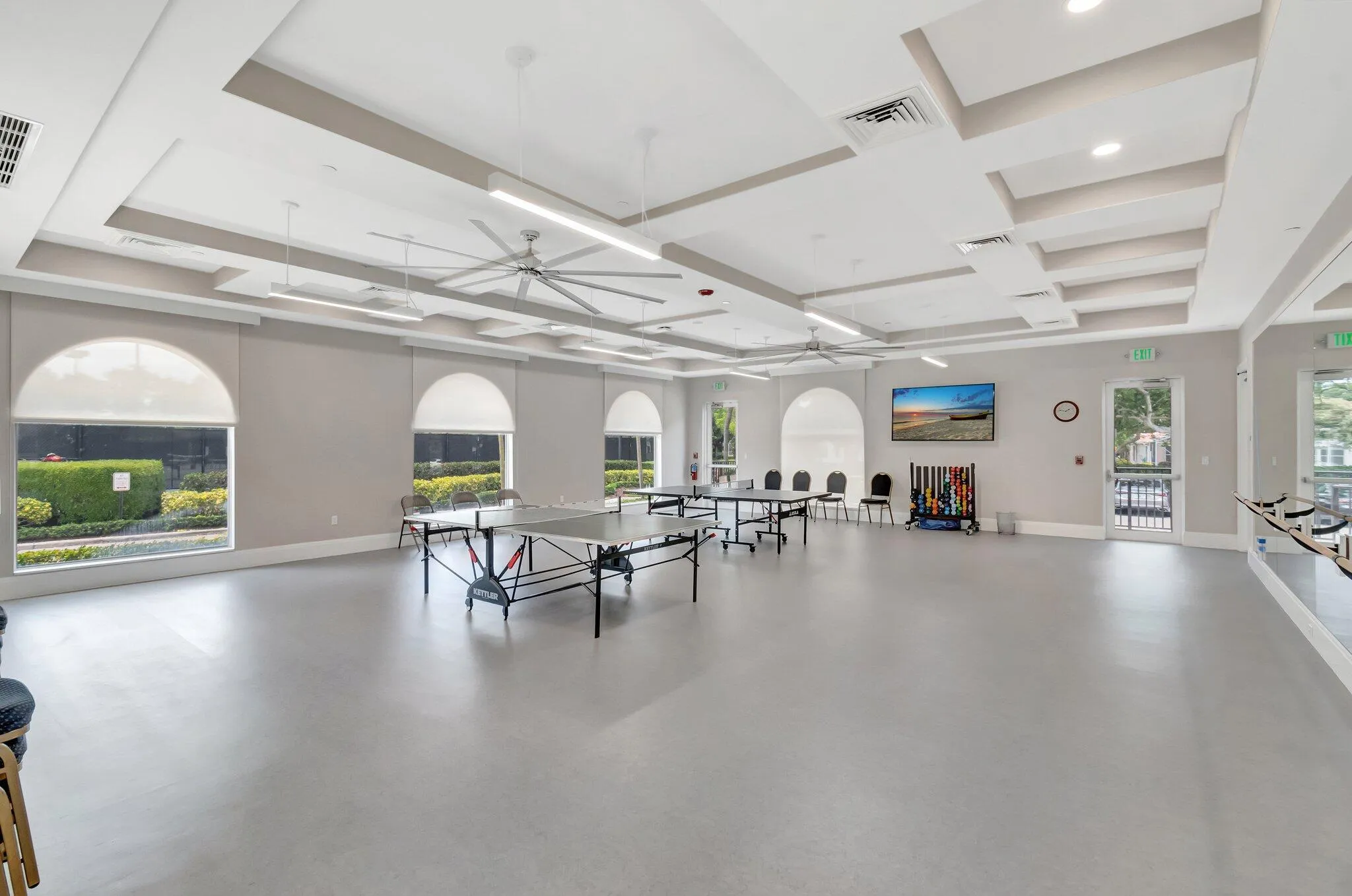 Multi-purpose room is used for indoor fitness classes and ping pong