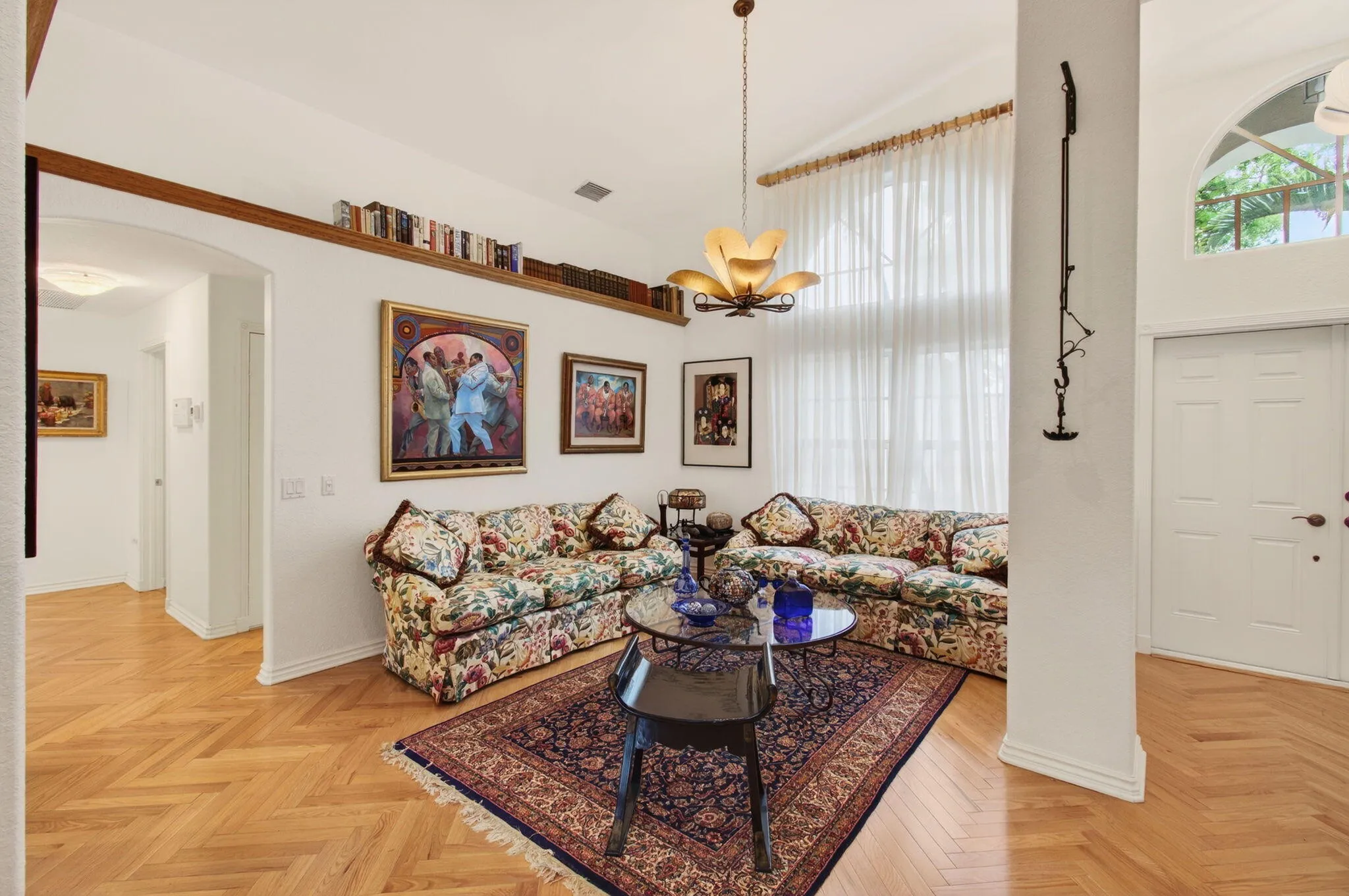 Utilizing the dining room as a conversation & reading spot created a large area for entertaining