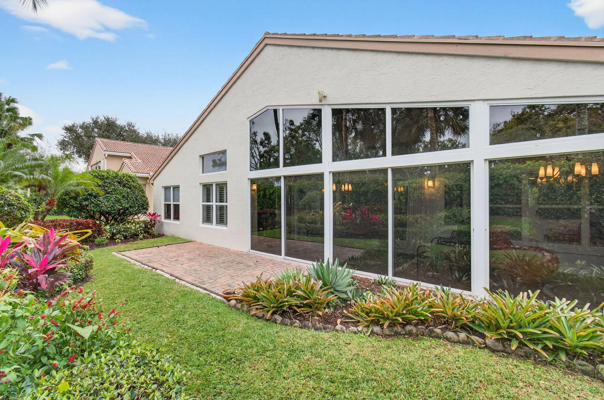 Most of the home's rear is impact glass