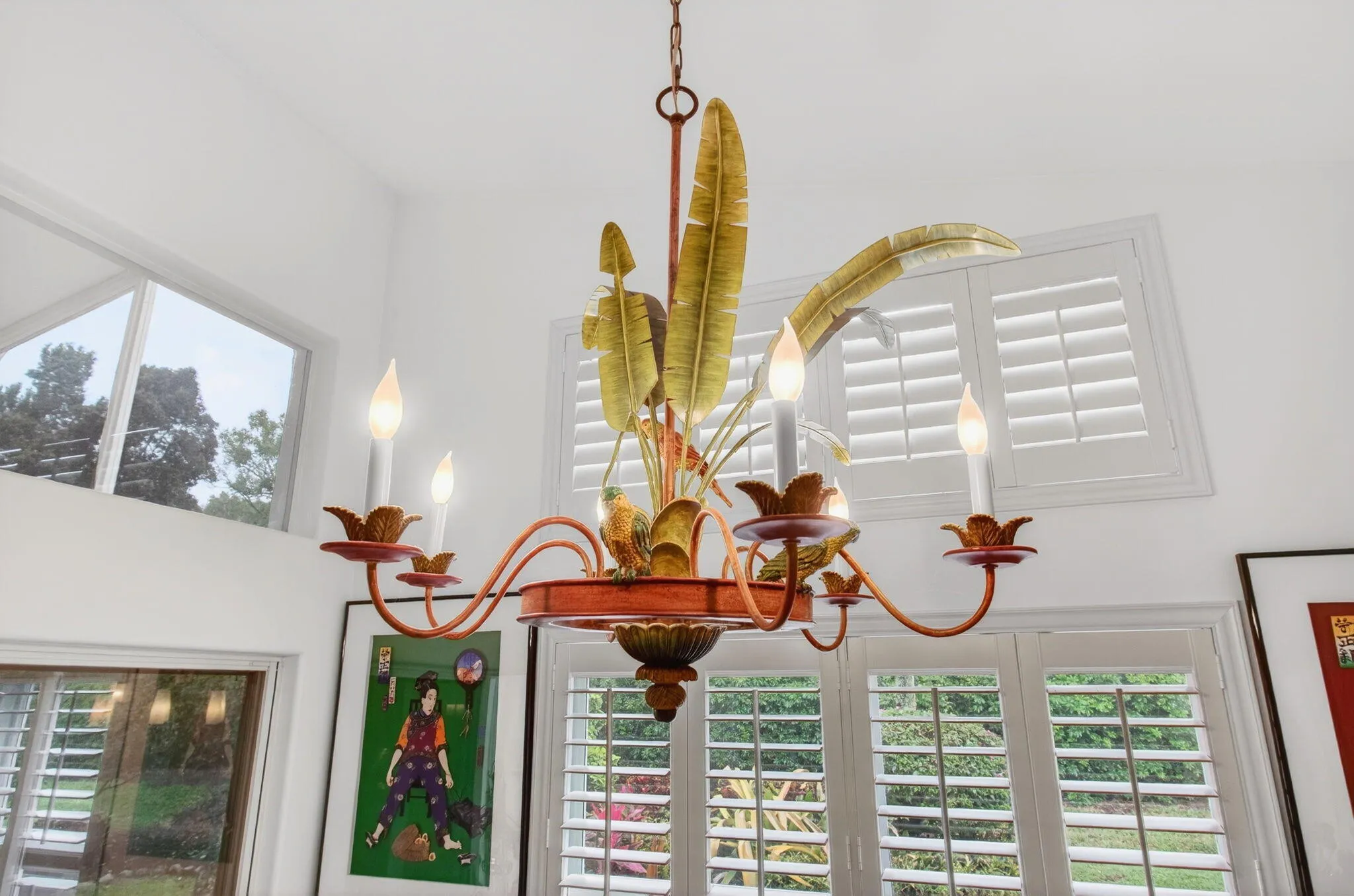Lighting fixtures and fans throughout the home have been carefully to selected to bring the flora and fauna of the outdoors inside