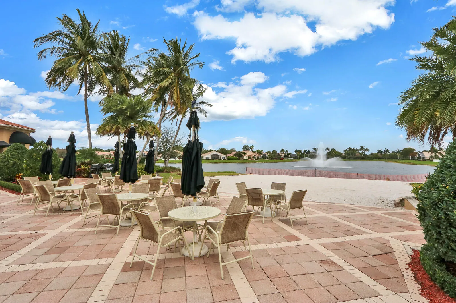 Lower Veranda has tables and chairs for picnicking and community parties