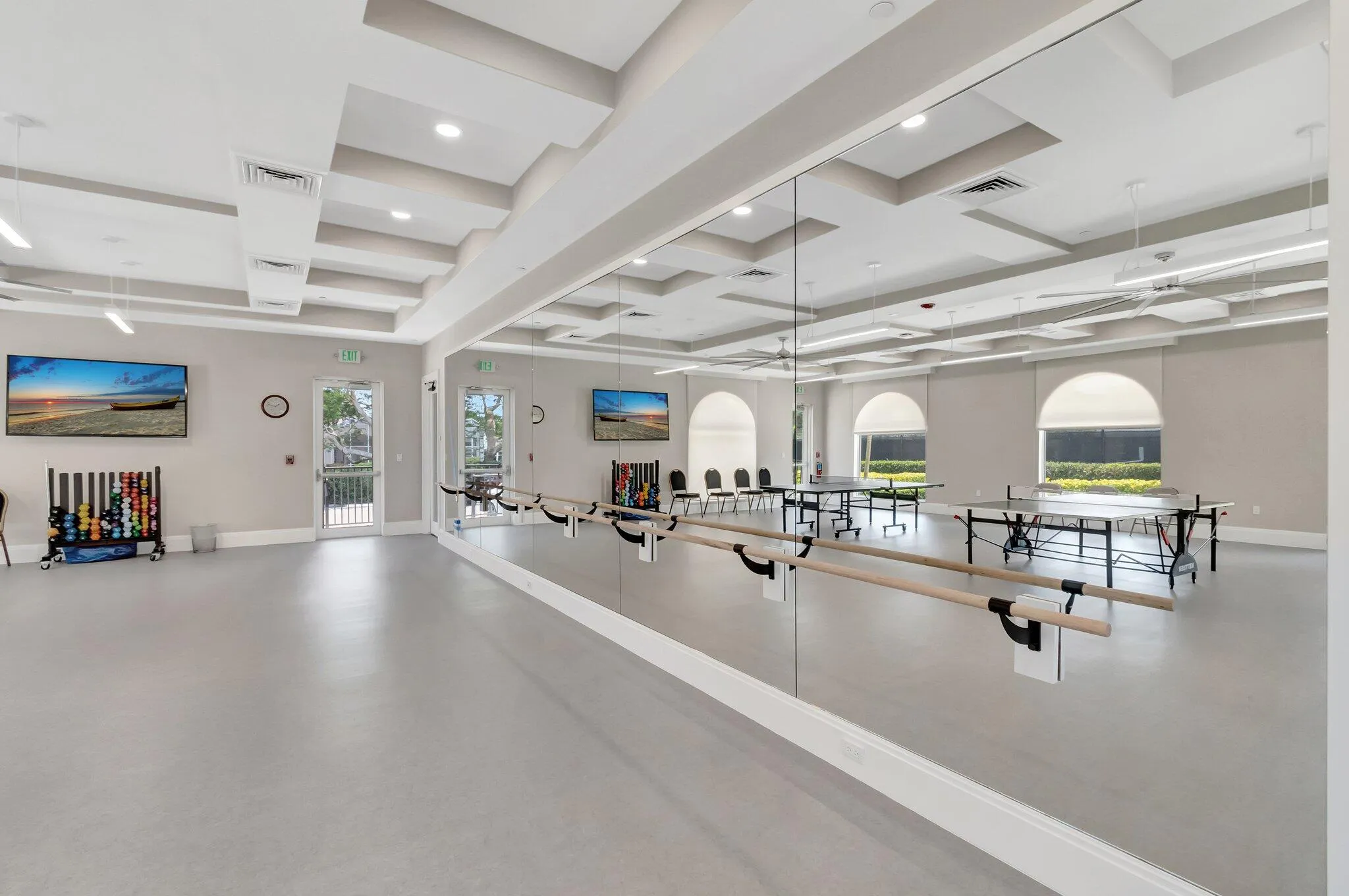 Balance bar, weights and mirrored wall for a variety of fitness and dance activities