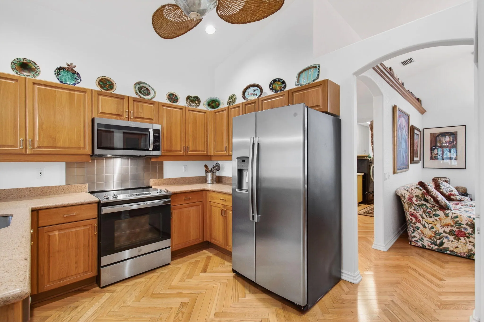 Beyond kitchen and adjacent to Formal Dining area is a large Butler's Pantry/Laundry Room