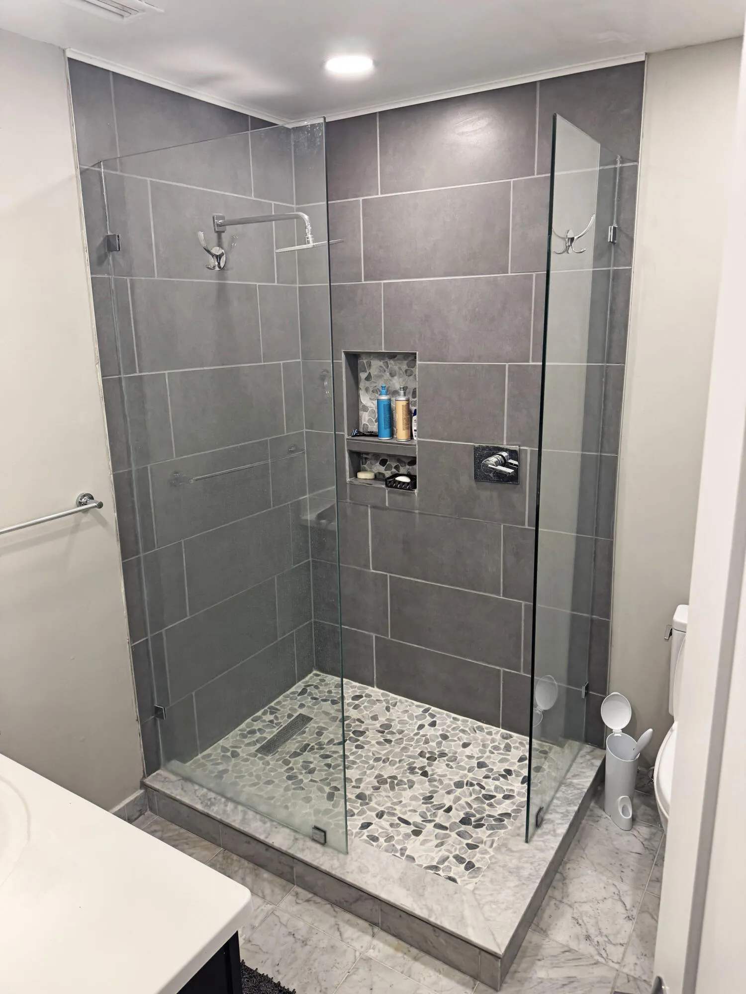Just upgraded to a frameless shower and custom new tile