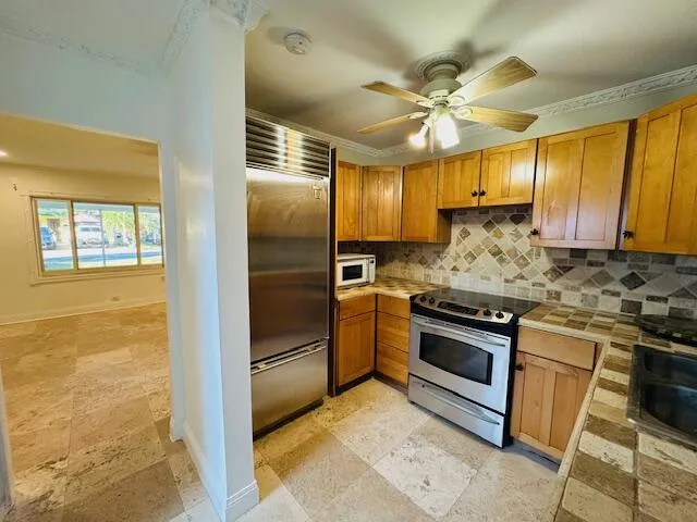 Living room enters into kitchen