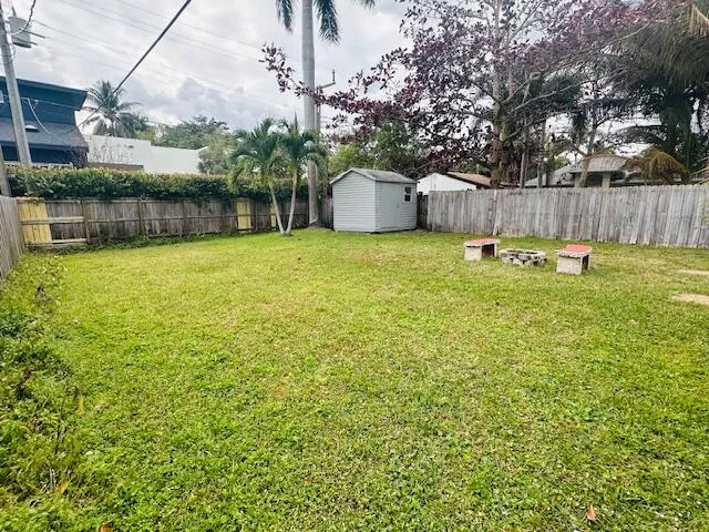 Large back yard with shed