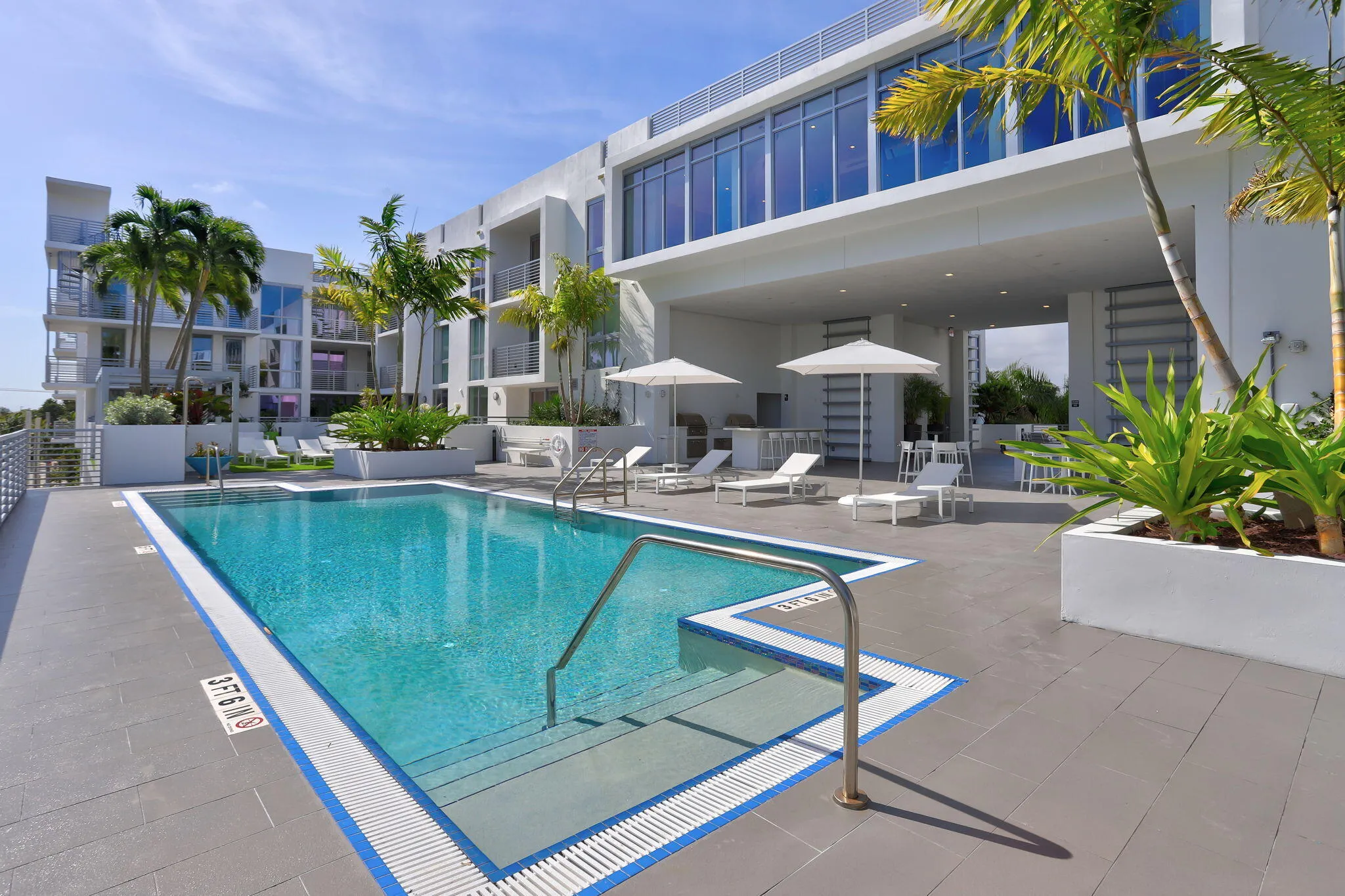 Tables and grills at pool area