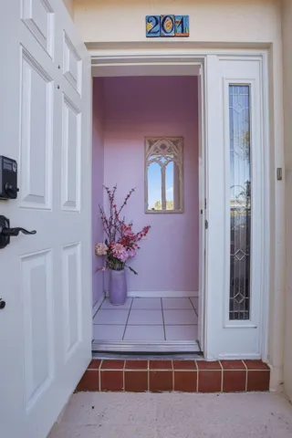 Step inside of this well cared for and highly desired end unit/corner townhome