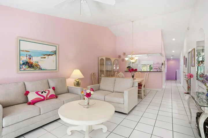 Spacious open living area with high vaulted ceilings and abundant natural light filled rooms