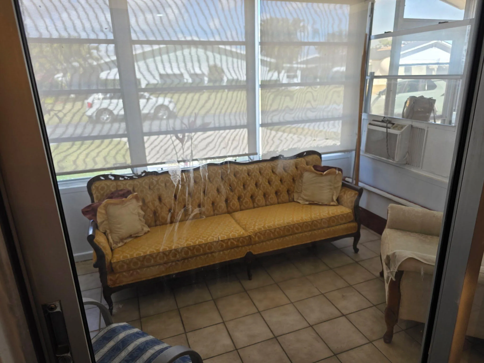Glass enclosed front patio