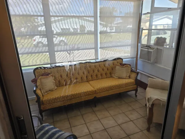 Glass enclosed front patio